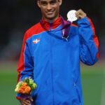 LONDON, ENGLAND - AUGUST 07:  Silver medalist Luguelin Santos of Dominican Republic poses on the podium during the medal ceremony for the Men's 400m on Day 11 of the London 2012 Olympic Games at Olympic Stadium on August 7, 2012 in London, England.  (Photo by Paul Gilham/Getty Images)